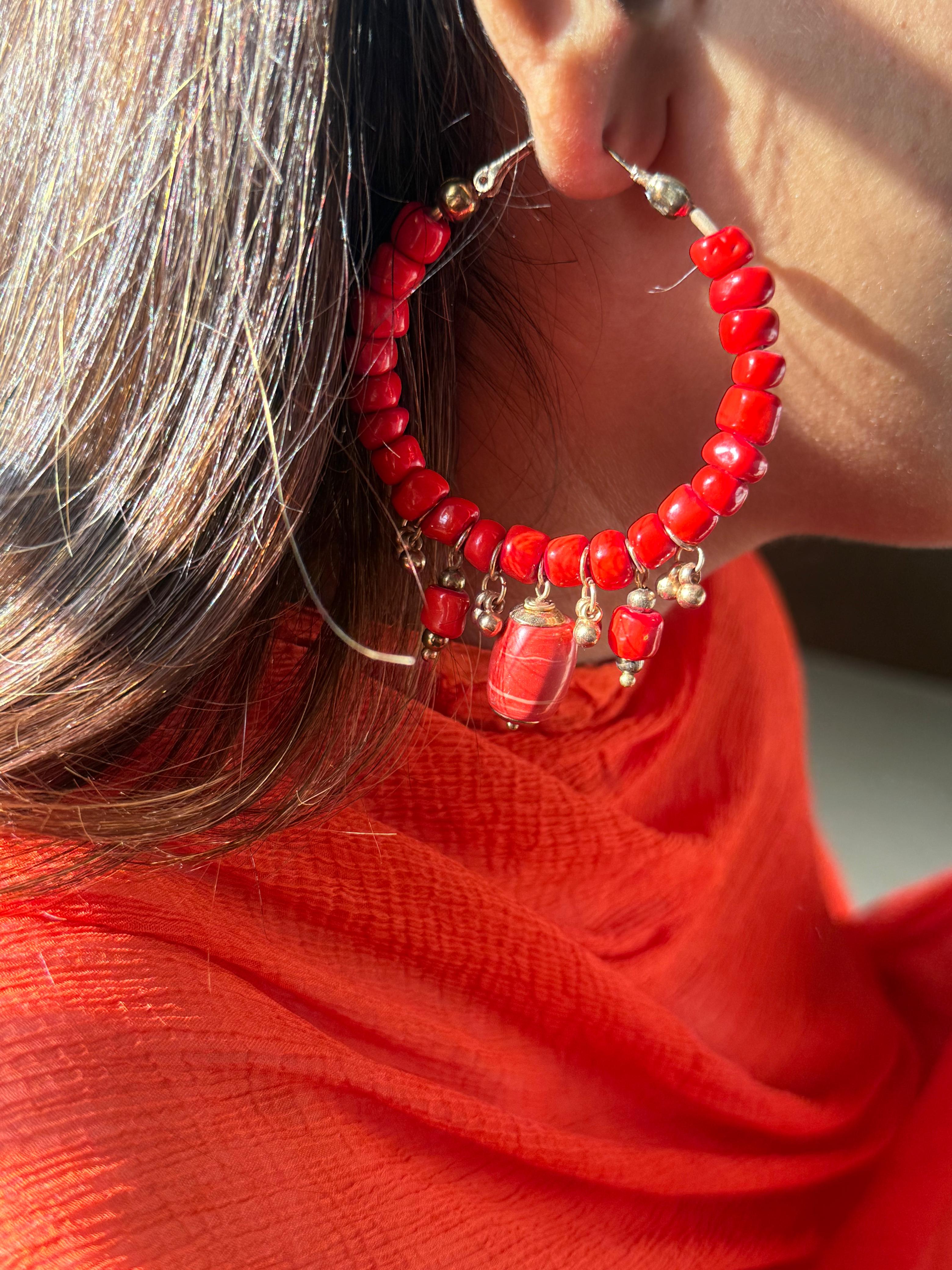 Beach inspired red coloured sunset coral hoops