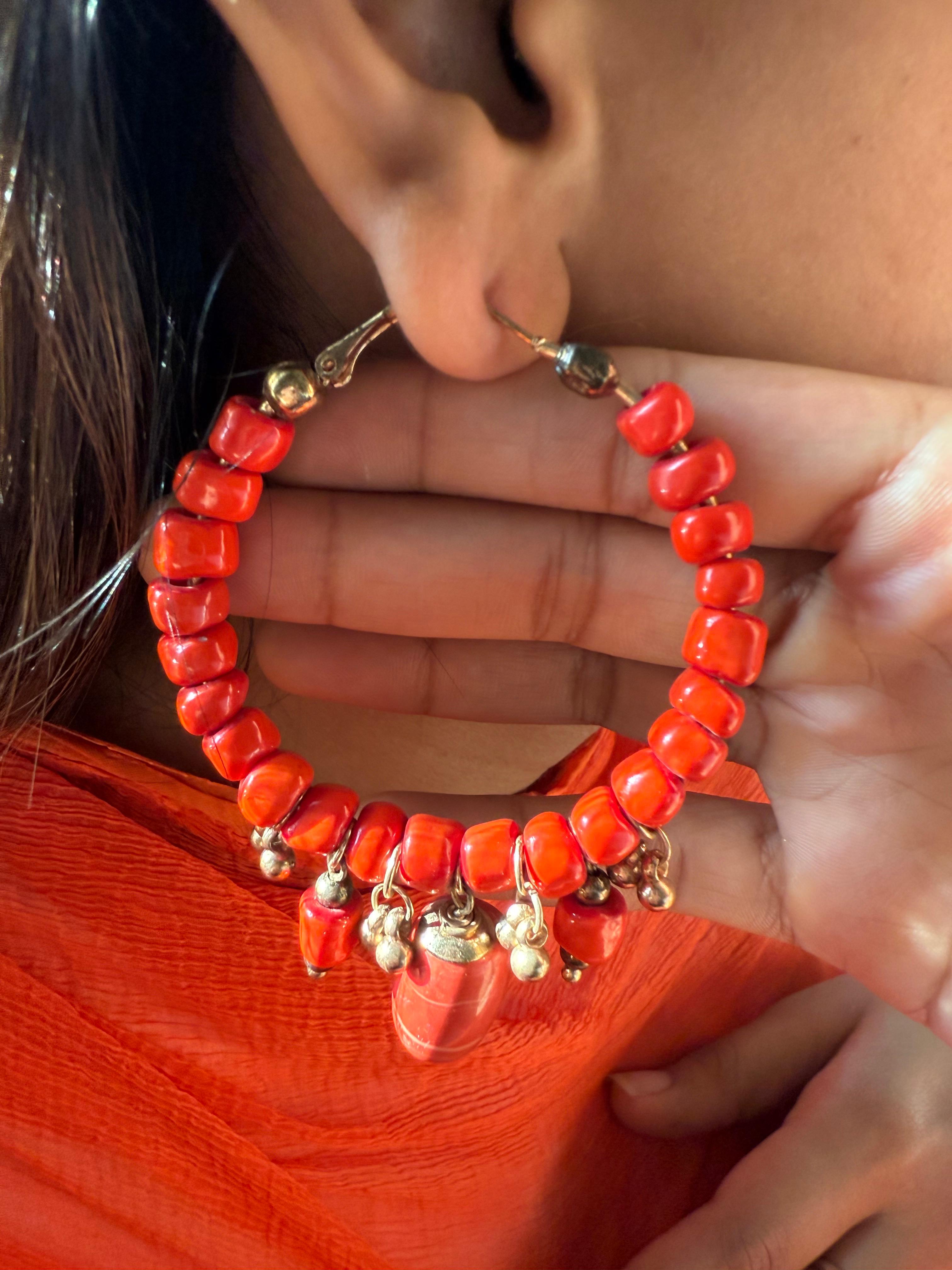 Beach inspired red coloured sunset coral hoops