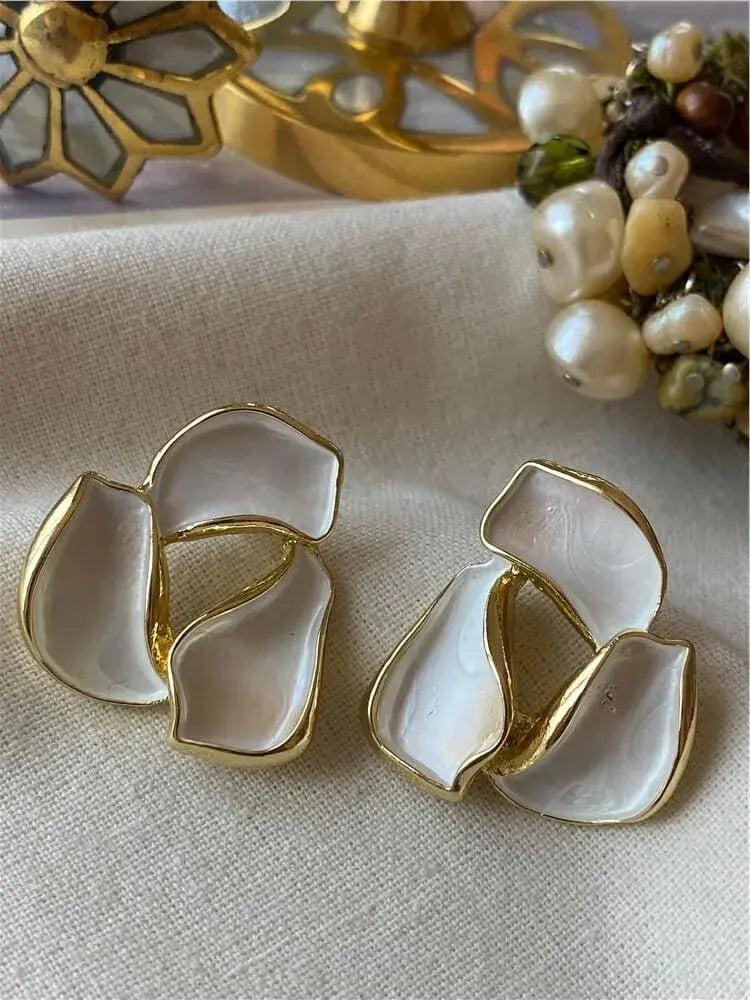 Dark romance gold finish white enamel stud earrings