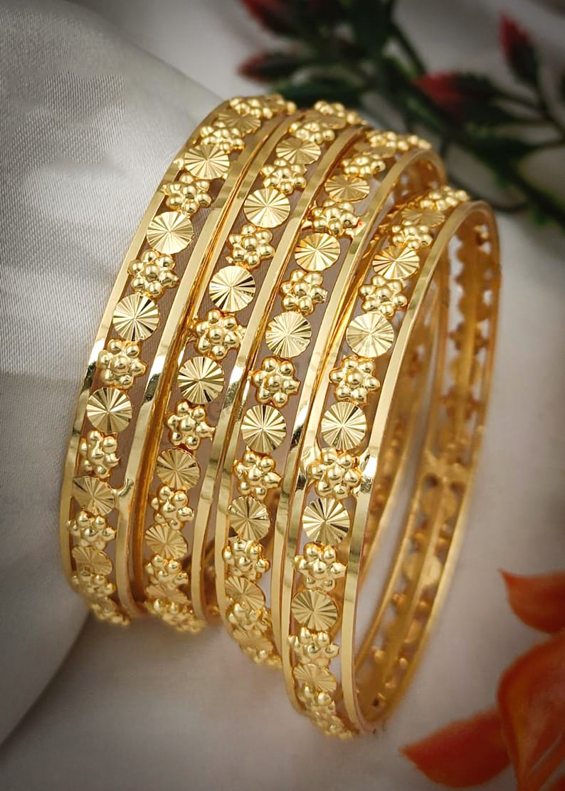 18k gold plated bangles with an intricate design
