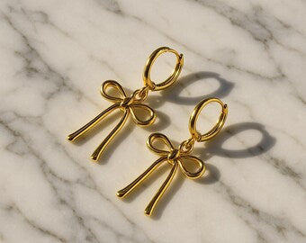 Gold plated most stylish bow earrings