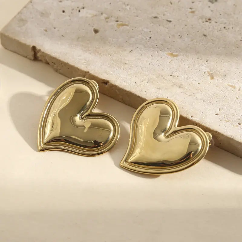 Gold shape Heart earrings- Fluffy women jumia Egypt
