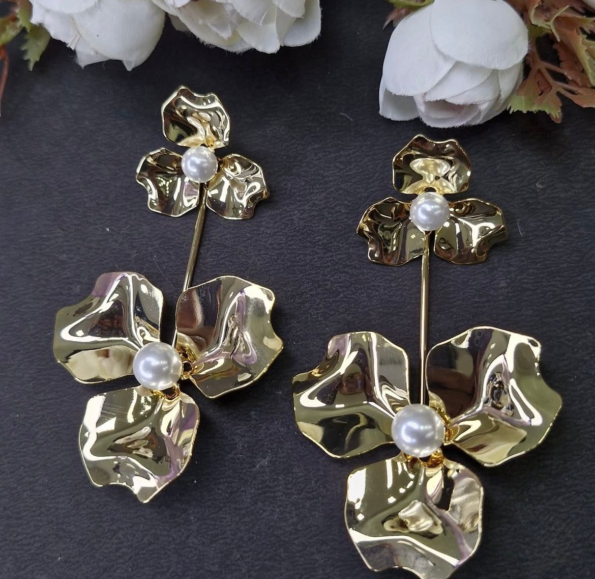 Aster golden flowery and pearls statement earrings.